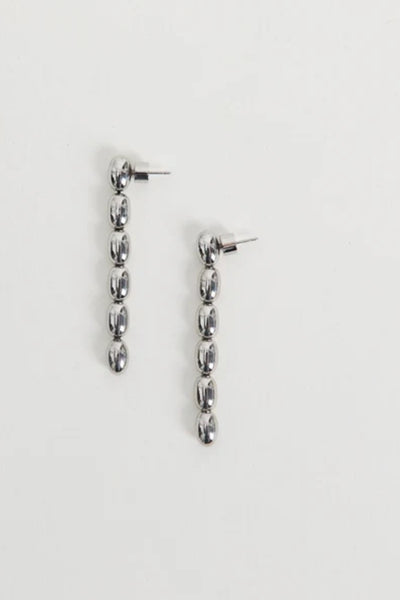 Edith Earrings in Silver by Heaven Mayhem – gold twisted-bead drop earrings with sculptural movement and shine, perfect for refined everyday styling.