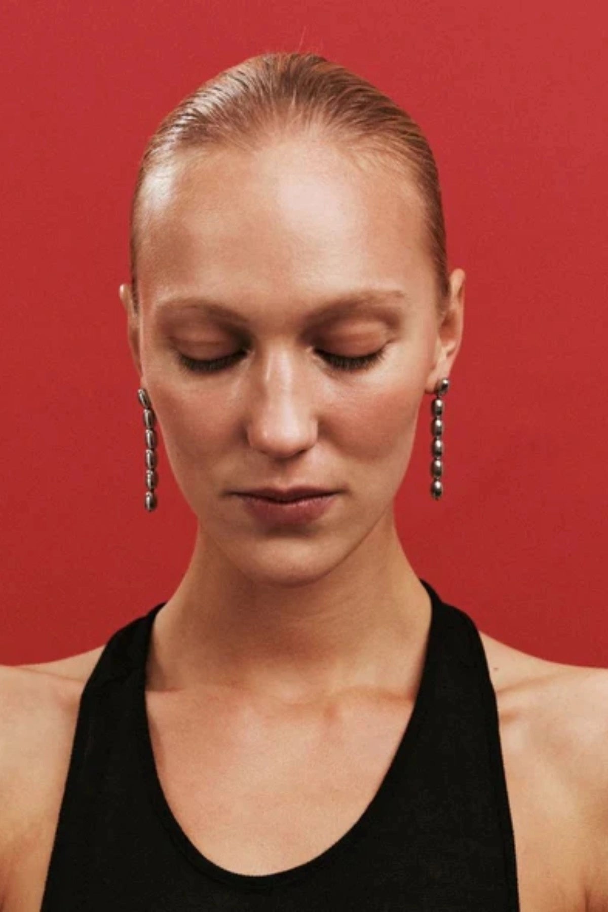 Edith Earrings in Silver by Heaven Mayhem – gold twisted-bead drop earrings with sculptural movement and shine, perfect for refined everyday styling.