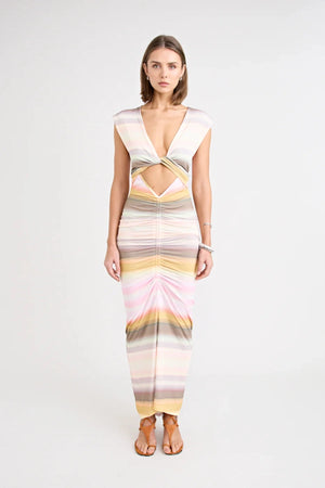 Elara Dress by Pfeiffer — a peach-toned stretch jersey midi with adjustable ties and front ruching for a custom, flattering silhouette.