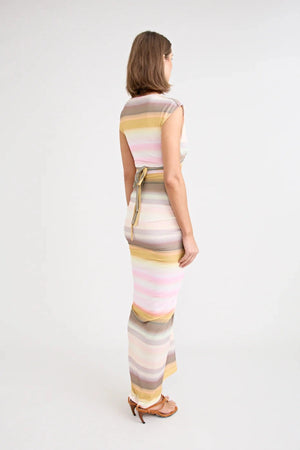 Elara Dress by Pfeiffer — a peach-toned stretch jersey midi with adjustable ties and front ruching for a custom, flattering silhouette.