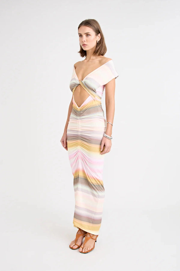 Elara Dress by Pfeiffer — a peach-toned stretch jersey midi with adjustable ties and front ruching for a custom, flattering silhouette.