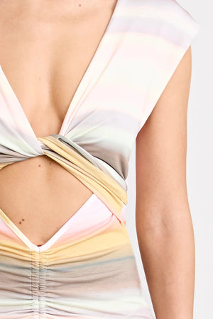 Elara Dress by Pfeiffer — a peach-toned stretch jersey midi with adjustable ties and front ruching for a custom, flattering silhouette.