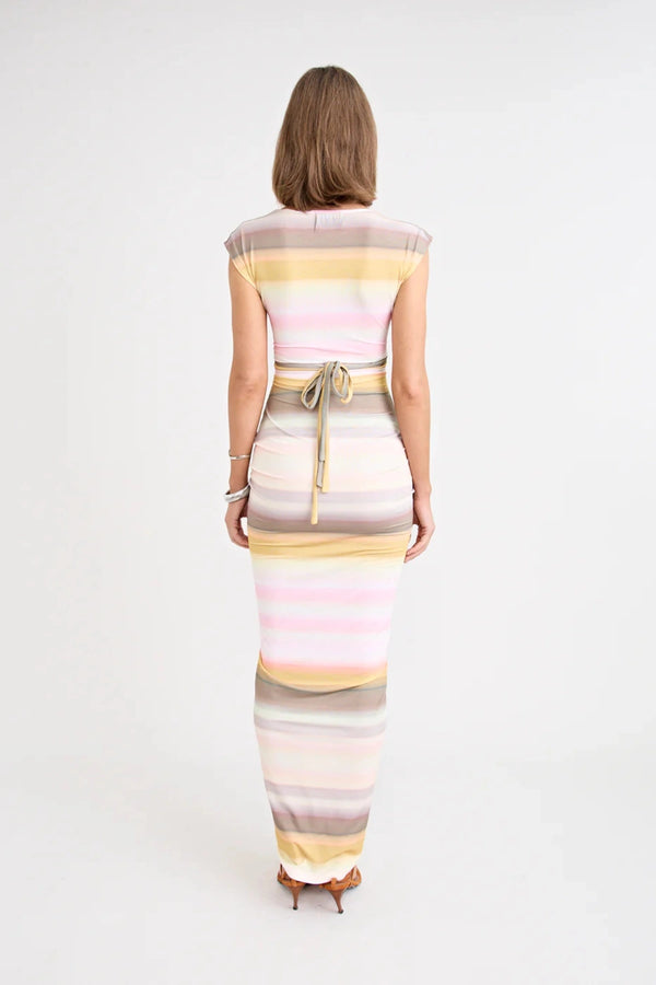 Elara Dress by Pfeiffer — a peach-toned stretch jersey midi with adjustable ties and front ruching for a custom, flattering silhouette.