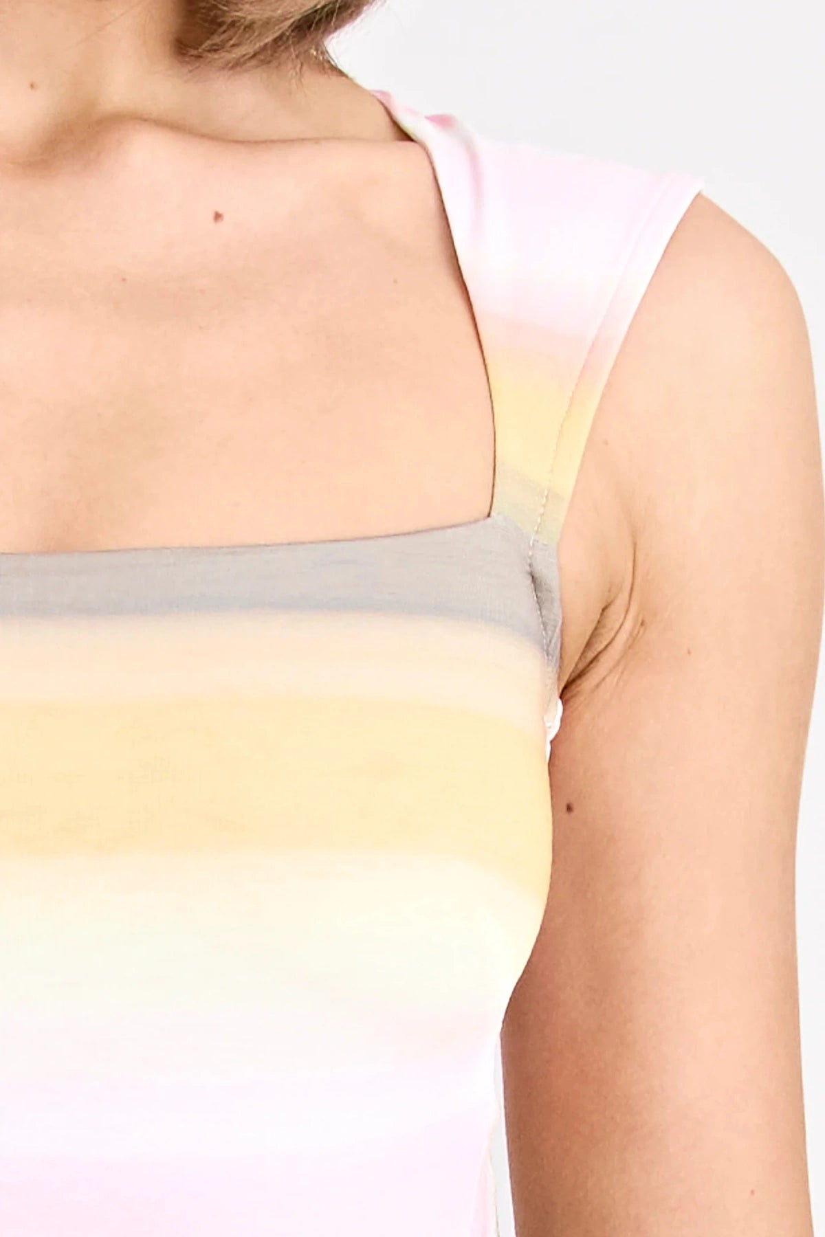 Elara Dress by Pfeiffer the Label, a printed stretch maxi with gathered sides and front split. Perfect for day-to-night styling.
