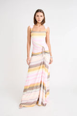 Elara Dress by Pfeiffer the Label, a printed stretch maxi with gathered sides and front split. Perfect for day-to-night styling.
