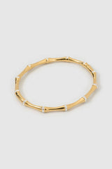 Electra Gold Cuff by Arms of Eve, sculptural gold cuff adorned with shimmering zircon stones for a bold, glamorous statement from day to night.