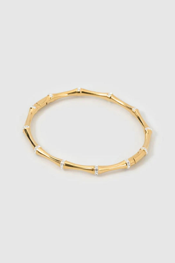 Electra Gold Cuff by Arms of Eve, sculptural gold cuff adorned with shimmering zircon stones for a bold, glamorous statement from day to night.