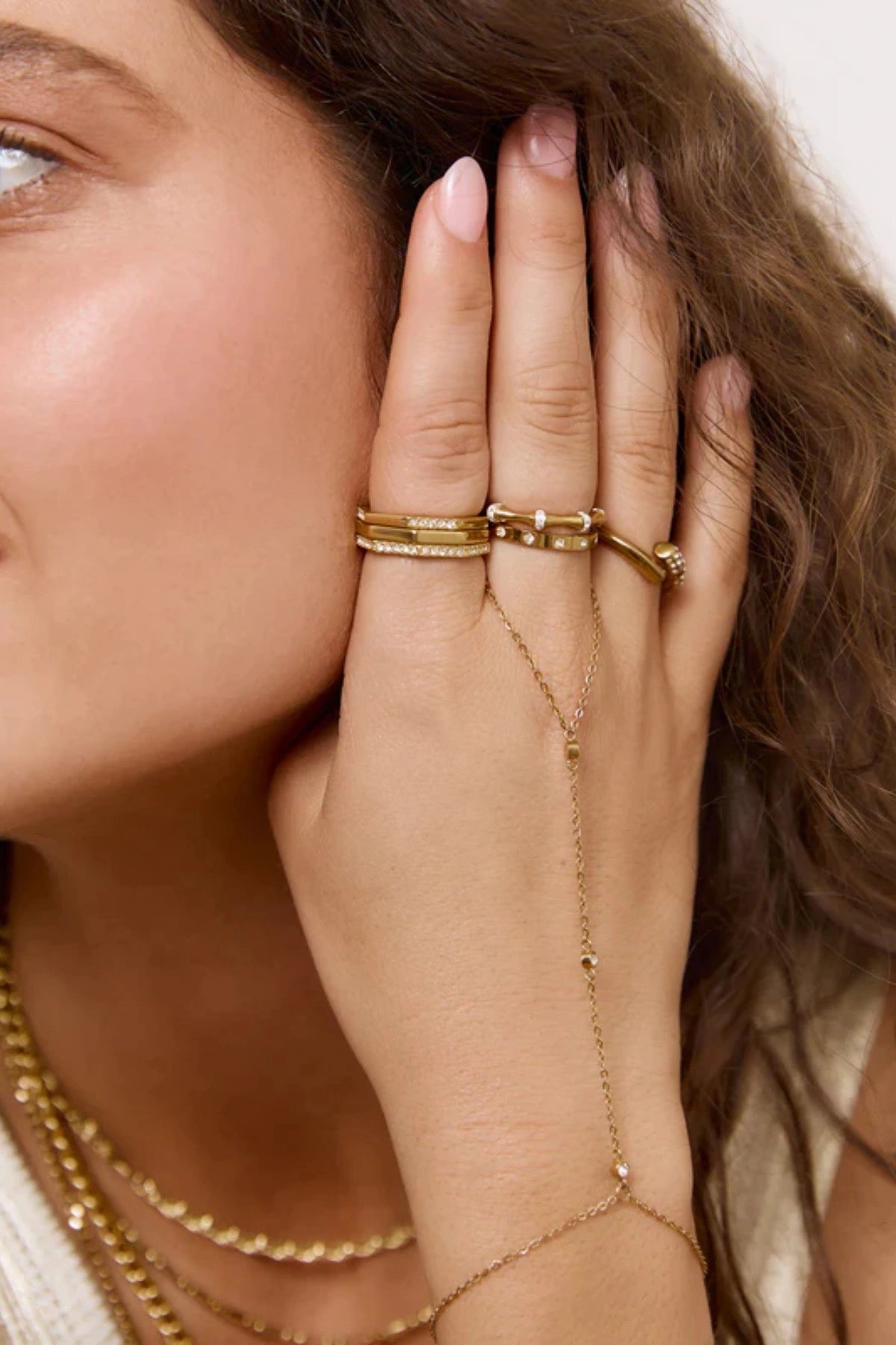 Electra Gold Ring by Arms of Eve, radiant gold band adorned with glistening zircon stones for a modern, stackable touch of everyday glamour