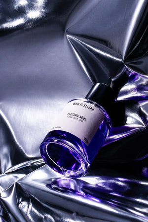 Electric Soul by Who Is Elijah, a seductive floral, musk, spice fragrance with notes of pink pepper, pear, jasmine, rose, amber, vanilla, and sandalwood, bold, daring, unforgettable.