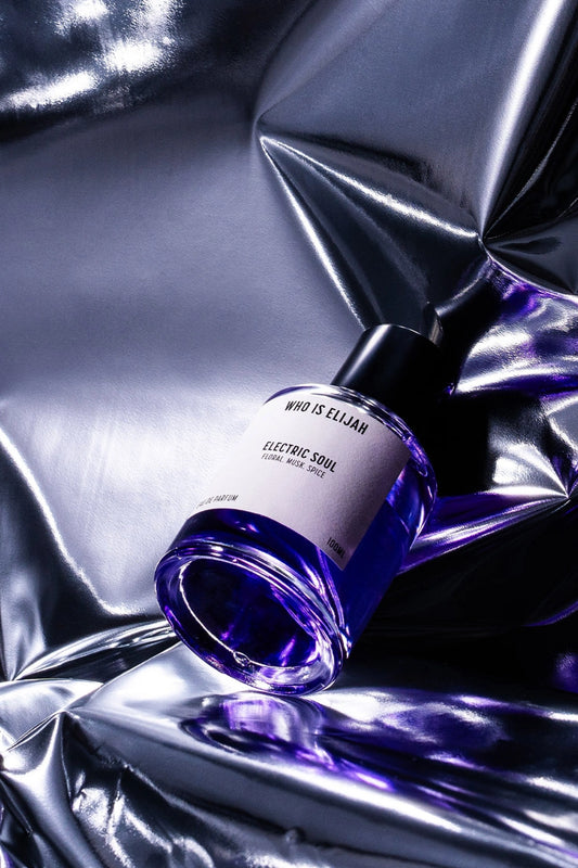 Electric Soul by Who Is Elijah, a seductive floral, musk, spice fragrance with notes of pink pepper, pear, jasmine, rose, amber, vanilla, and sandalwood, bold, daring, unforgettable.