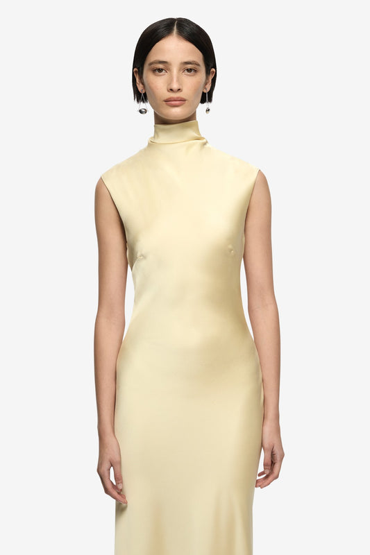 Elias Maxi Dress Butter by Bec + Bridge, cowl neck maxi dress with cap sleeves and backless detail. Perfect for events or elegant evenings.