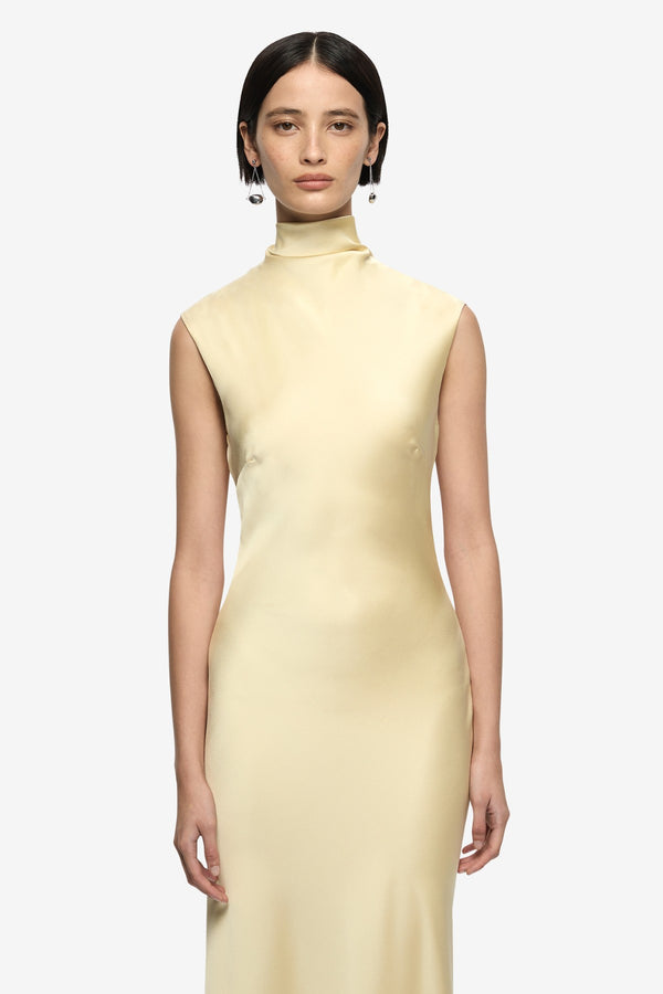 Elias Maxi Dress Butter by Bec + Bridge, cowl neck maxi dress with cap sleeves and backless detail. Perfect for events or elegant evenings.