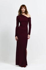 Cayley Gown by Eliya The Label, an off-shoulder stretch crepe gown with a side split and sculpted fit. Perfect for elegant formal events.