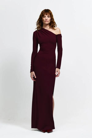 Cayley Gown by Eliya The Label, an off-shoulder stretch crepe gown with a side split and sculpted fit. Perfect for elegant formal events.