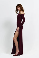 Cayley Gown by Eliya The Label, an off-shoulder stretch crepe gown with a side split and sculpted fit. Perfect for elegant formal events.