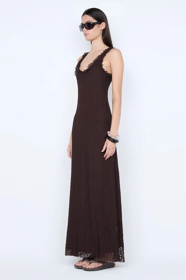 Emaretta Scoop Maxi Dress by Bec + Bridge, a sheer lace silhouette with scoop neckline and cap sleeves for a bold yet elegant evening statement.