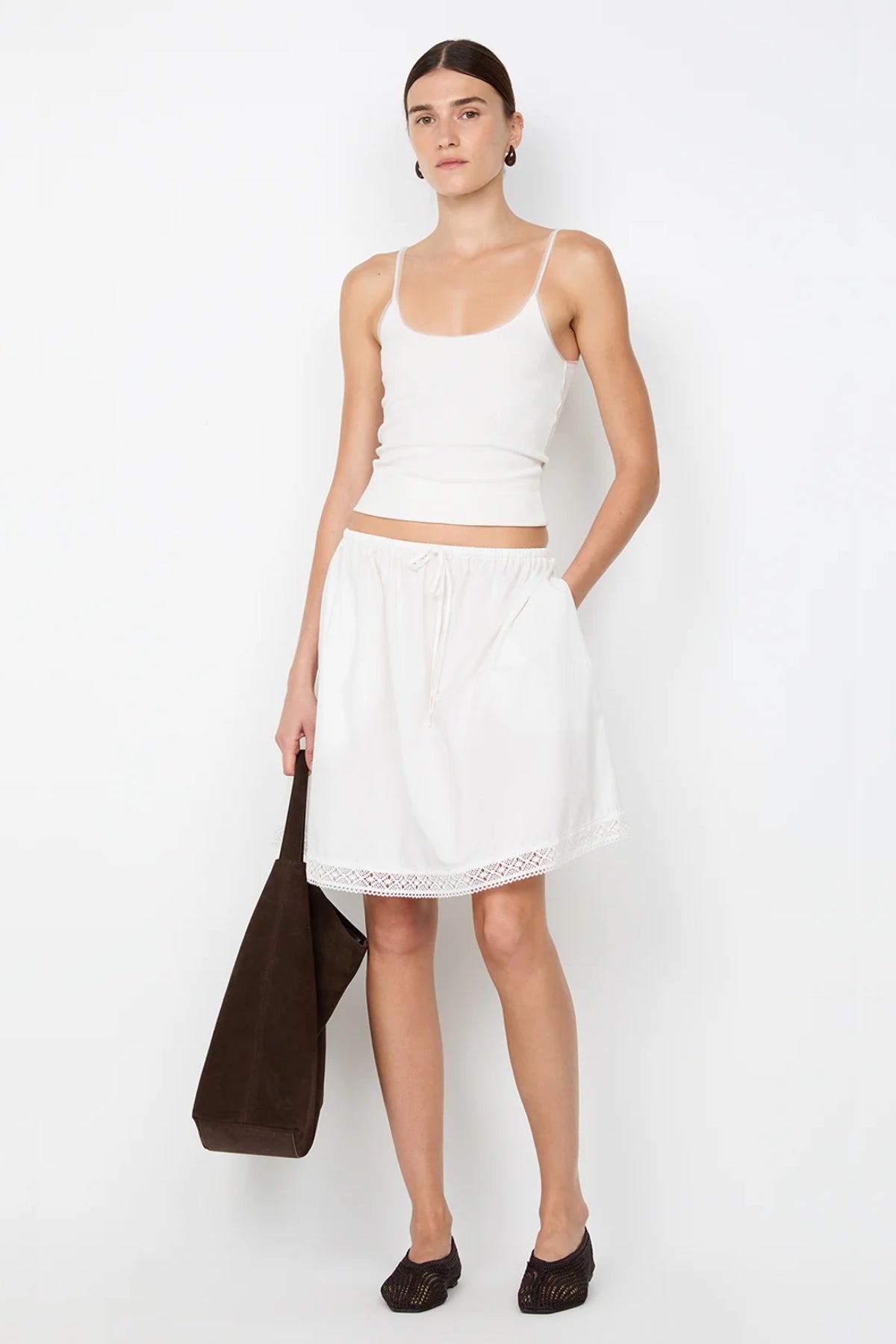 Emerson Tank in Ivory by Bec + Bridge, a ribbed cotton tank with sheer tulle trim and scoop neckline. Perfect for everyday layering or polished looks.