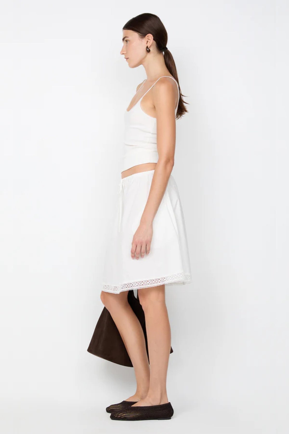 Emerson Tank in Ivory by Bec + Bridge, a ribbed cotton tank with sheer tulle trim and scoop neckline. Perfect for everyday layering or polished looks.