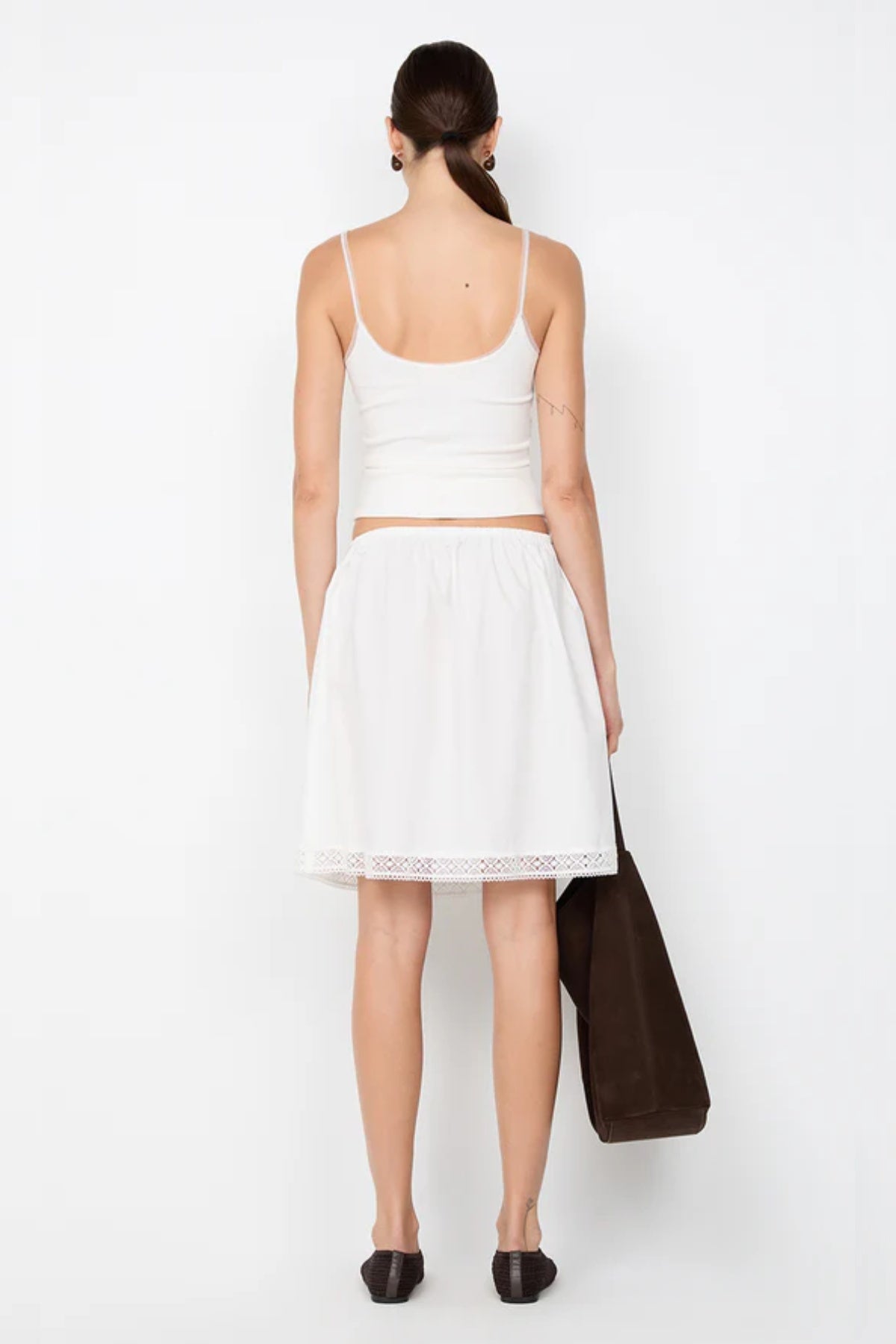 Emerson Tank in Ivory by Bec + Bridge, a ribbed cotton tank with sheer tulle trim and scoop neckline. Perfect for everyday layering or polished looks.
