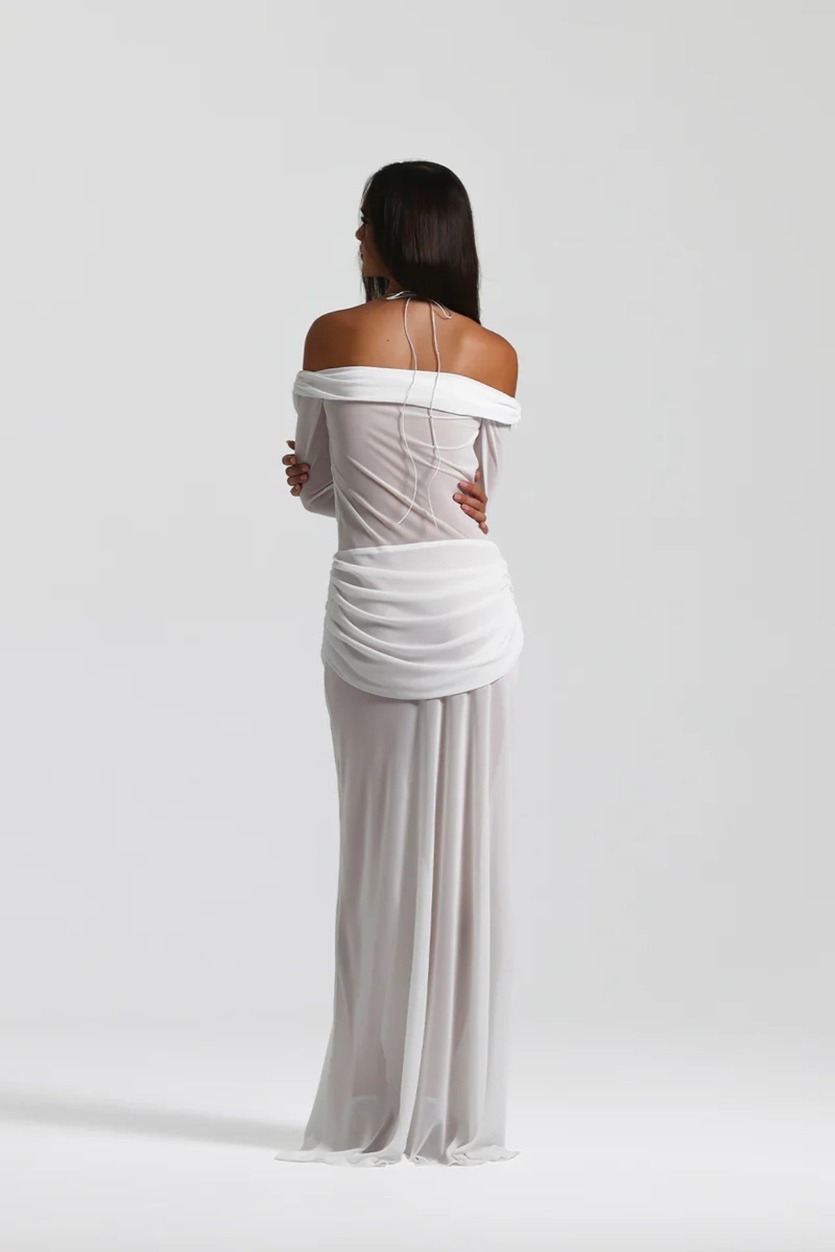 Emily Gown White by Natalie Rolt, sheer layered georgette with knot bust and flowing skirt for dreamy event elegance.