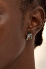 Endless Skies Hoops by By Charlotte – 18k gold plated illusion hoops with blue aquamarine and sapphire gemstones.