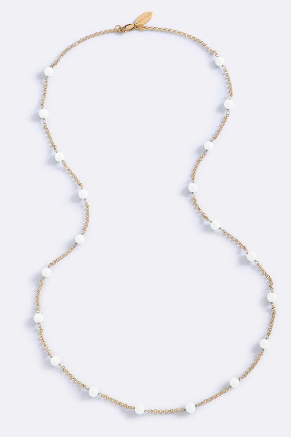 Endless Summer Beads White Glo by Emma Pills – gold plated long necklace with white enamel bead detailing.