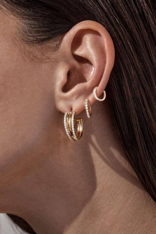 Entwined Hearts Large Hoops by By Charlotte — gold-plated intertwined crystal hoops symbolising connection and everyday elegance.