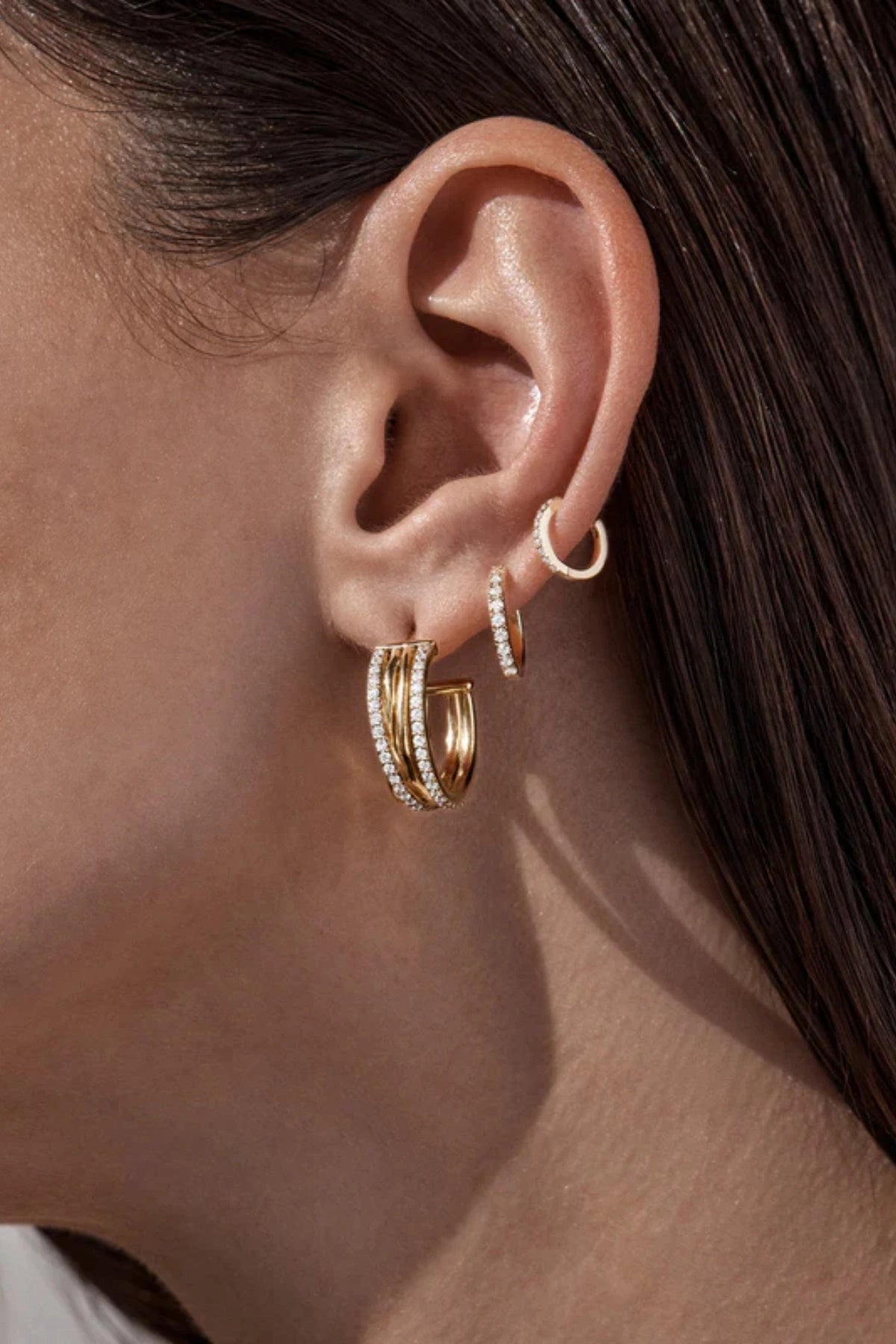 Entwined Hearts Large Hoops by By Charlotte — gold-plated intertwined crystal hoops symbolising connection and everyday elegance.