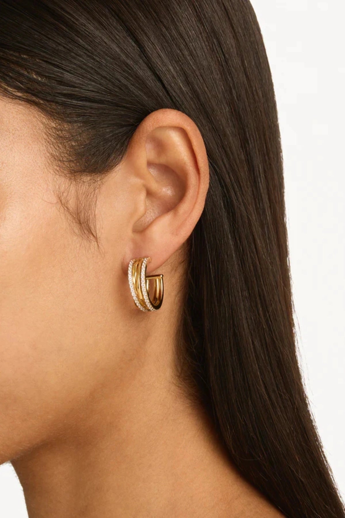 Entwined Hearts Large Hoops by By Charlotte — gold-plated intertwined crystal hoops symbolising connection and everyday elegance.