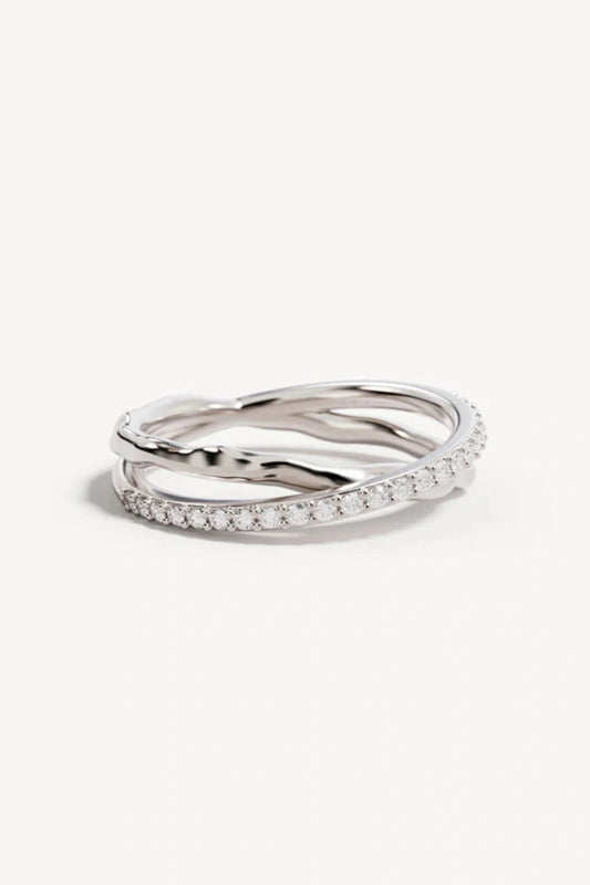 Entwined Hearts Ring by By Charlotte — a sterling silver double-band ring with intertwined crystal details, perfect for timeless everyday wear.