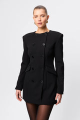 Even Odds Mini Dress Black by Mossman - tailored mini dress with structured shoulders and double breasted detail, designed for a sharp modern silhouette.