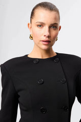 Even Odds Mini Dress Black by Mossman - tailored mini dress with structured shoulders and double breasted detail, designed for a sharp modern silhouette.