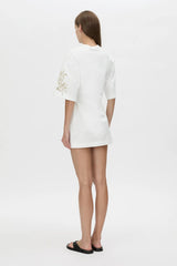 Eviva Mini Dress Soft White by Camilla and Marc, sculptural white mini with bold shoulders and intricate beaded detailing.