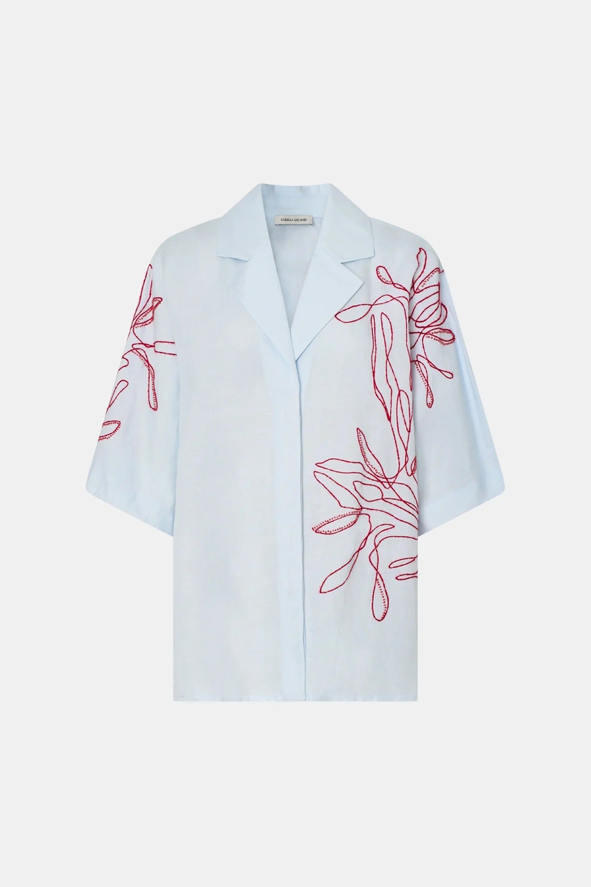 Eviva Shirt in Ice Blue by Camilla and Marc – a clshort-sleeve shirt with beaded embroidery and clean lines, perfect for bright polished days.