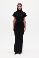 Evren Knit Top Black by Bayse – sculptural wool blend knit top with asymmetric wrap waist and high neckline.