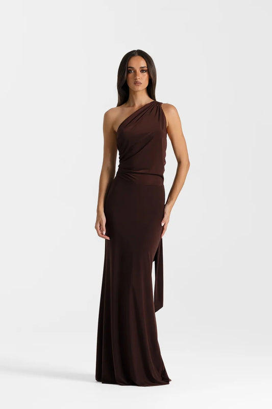 Fabienne Gown Espresso by Natalie Rolt, ruched one shoulder maxi dress with low back and adjustable tie details.