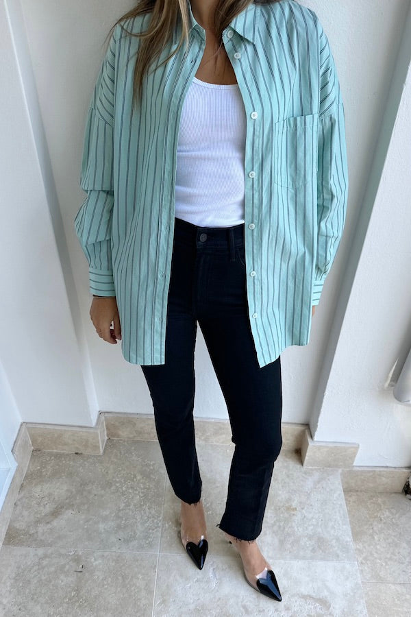 The Hustler Ankle Fray Jeans Not Guilty by MOTHER, vintage-inspired high-rise cropped bootcut in classic black denim, perfect for trendy casual looks.