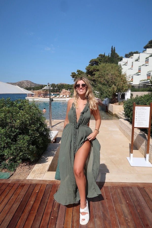 NEW Artemis Dress Khaki by D'Artemide – Cotton halter dress with fringe, low back, front split, and cold hand wash.