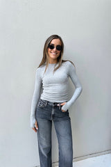 Brooklyn Top by Mossman – a fitted knit top with high neckline and thumb sleeves. Perfect for layering or everyday wear.