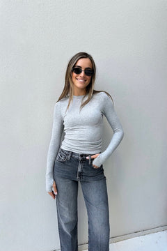 Brooklyn Top by Mossman – a fitted knit top with high neckline and thumb sleeves. Perfect for layering or everyday wear.