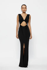 Faith Dress Black by Effie Kats, a reversible jersey gown with twist detail, cutout bodice, and soft train. Perfect for romantic events.