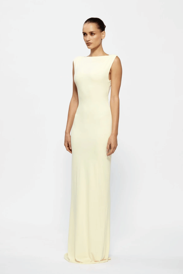 Faith Dress by Effie Kats – a maxi dress with V neckline, cutout, and ruched detail. Perfect for romantic event styling.