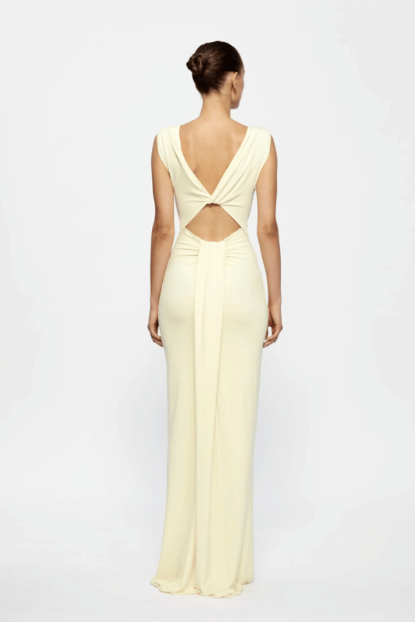 Faith Dress by Effie Kats – a maxi dress with V neckline, cutout, and ruched detail. Perfect for romantic event styling.