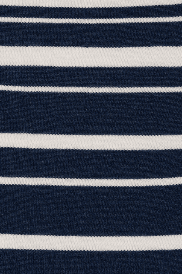 Axel Maxi Dress in Accordion Stripe Creamy Navy by Faithfull the Brand, chic halter-neck dress with a relaxed skirt and bust band detail, perfect for warm-weather events.