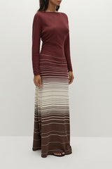 Faithfull the Brand Idun Maxi Dress in Accordion Stripe Bordeaux, knit maxi with boat neckline, twist back detail, and flared skirt.
