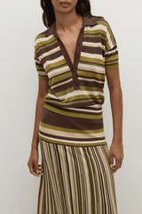 Sable Polo Shirt in Espresso Pine Stripe by Faithfull the Brand, classic polo with a deep V-neck and ribbed waistband, perfect for a chic, casual look when paired with coordinating skirts or denim.