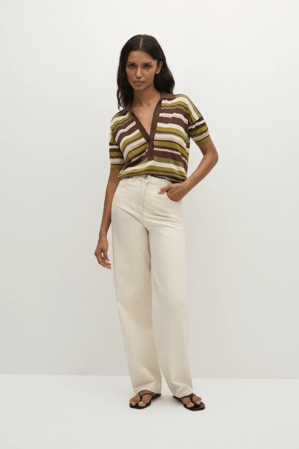 Sable Polo Shirt in Espresso Pine Stripe by Faithfull the Brand, classic polo with a deep V-neck and ribbed waistband, perfect for a chic, casual look when paired with coordinating skirts or denim.