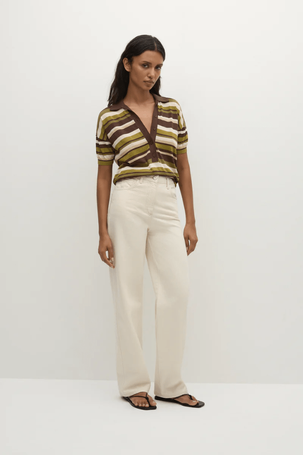 Sable Polo Shirt in Espresso Pine Stripe by Faithfull the Brand, classic polo with a deep V-neck and ribbed waistband, perfect for a chic, casual look when paired with coordinating skirts or denim.
