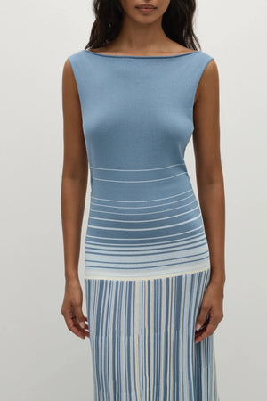 Faithfull the Brand Xyla Maxi Dress in Accordion Stripe Mineral Blue with boat neckline, twist knot back and flared A-line skirt.