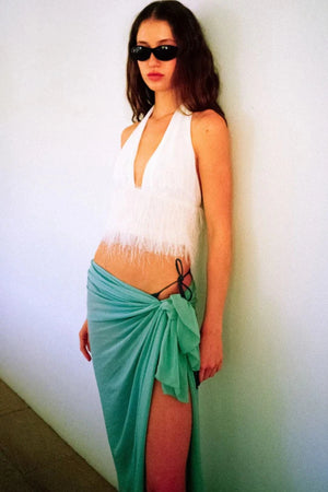 Finley Top by Bec + Bridge, a sleek halter silhouette with a statement fringe underbust detail—perfect for bridal celebrations or chic summer styling.